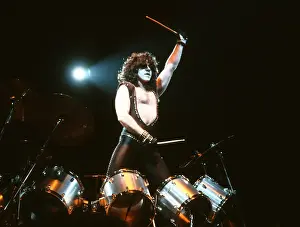 Prints of CIRCA 1985: Drummer Eric Carr of the rock and roll band Kiss performs onstage in circa 1985. (Photo by Michael Ochs Archives/Getty Images) Icons Unmasked: Kiss Performing
