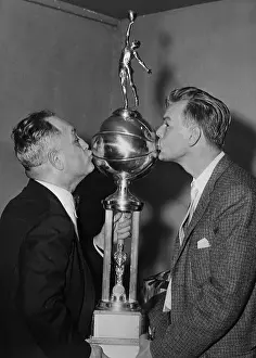 Kissing the Trophy