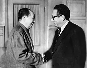 Kissinger And Tse-Tung Shake Hands