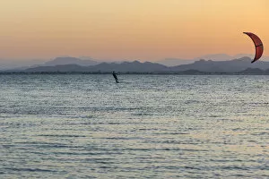 Oman Gallery: Kitesurfer, surfing on the blue lagoon of Ras Al Hadd Lagoon in the evening light, Ras Al Hadd