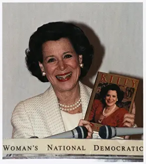 Kitty Carlisle Holding New Book
