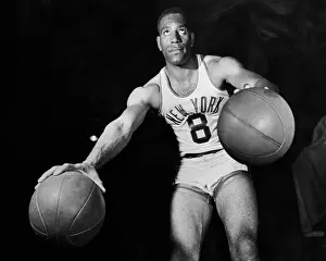 Knicks Nat Clifton Holding Two Balls