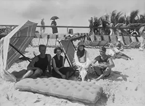 Edward F Prints: Well Known Socialite Couples Enjoying Beach