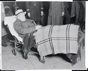 Knute Rockne Lying on Cot to Watch Football Game