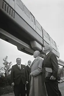 Konrad Adenauer and Axel Wenner-Gren Looking at Monorail Train