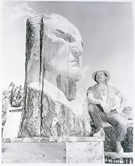 Korczak Ziolkowski Posing Next to Sculpture