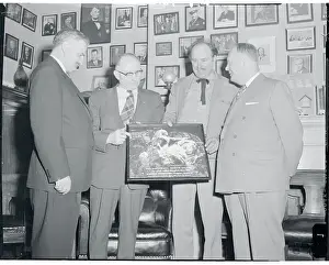 Karl E Prints: Korczak Ziolkowski Showing Photograph to Colleagues