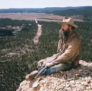 Korczak Ziolkowski Sitting on Mountain Peak