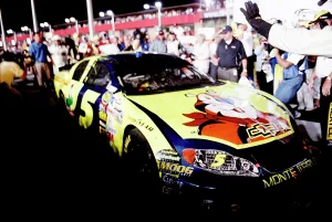 Prints of American stock car racer Kyle Bush and his crew at the Sony HD 500 in 2005 in Fontana, California. (Photo by Gregory Bojorquez/Getty Images) Chasing Speed: Motorsport in Motion: Kyle Busch