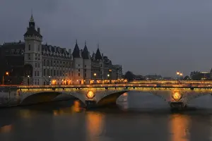 Seine River Prints: La Conciergerie at dusk, Paris, Ile-de-France, France