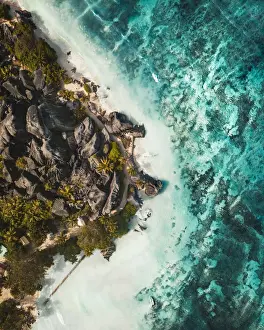Prints of La Digue is an island in the Seychelles, in the Indian Ocean off East Africa. Its known for its beaches, like Anse Source d Argent, dotted with granite boulders, on the west coast Aerial Art Prints: La Digue Aerial, Seychelles