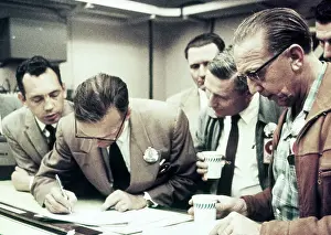 Information Prints: Lab Scientists Computing Data