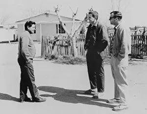 Delano Prints: Labor leader Cesar Chavez catting with Minister Wayne Hartmire