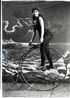 Lady Bicyclist In Circus Act