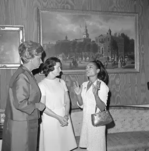 Prints of Singer Eartha Kitt (R) shouted angrily at Mrs. Lyndon B. Johnson, at a White House luncheon today that the nation's youth are rebelling because they are snatched off to be shot in Vietnam Captivating Art Prints Celebrating the Iconic Performer’s Legacy: Lady Bird Johnson and Eartha Kitt