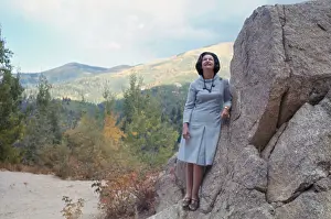 Santa Fe Prints: Lady Bird Johnson Posing Near Large Rock Formations