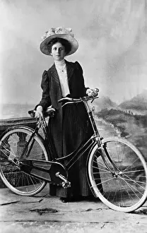 Postcard Prints: Lady In Flowerd Hat Poses With Bicycle