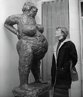 Lady Looking at Sculpture