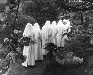 Prints of May 1964: Ladywell sisters walking in the convent grounds. (Photo by Chris Ware/Keystone Features/Getty Images) The Keystone Press Agency Collection Prints: Ladywell Sisters