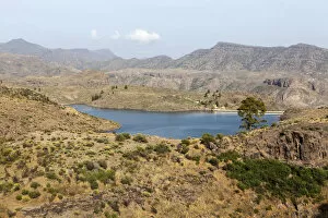 Lake El Juncal, a small reservoir in the Pinar de Pajonales National Park, Roque Bentaiga, Gran Canaria, Canary Islands
