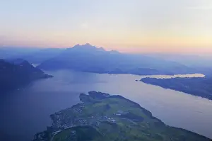 Lake Lucerne with the village of Weggis, in the distance, Pilatus Mountain, Lucerne, Switzerland, Europe
