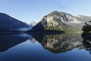 Reflected Gallery: Lake Plansee, Ammergau Alps, Ammergebirge mountains, in the back Mt