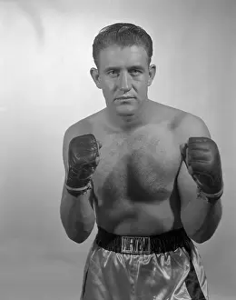 Prints of BRONX, NY - DECEMBER 4: Heavyweight professional boxer LaMar Clark (1934-2006) of the United States poses for a portrait on December 4, 1958 in the Bronx, New York In the Ring: The Art of Boxing: LaMar Clark