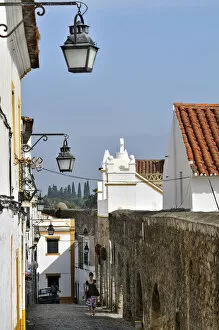 Portuguese Gallery: Lane in the historic district at the medieval aqueduct, Evora, UNESCO World Heritage Site