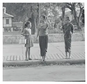 Vientiane Prints: Laotians in Wet Clothing
