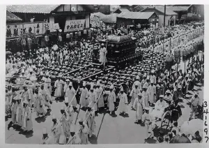 Seoul Prints: Large Array of People and Hearse in Street