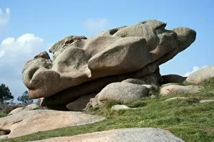 Large boulder lying diagonally on a slope, Cote de Granit Rose, Brittany, France, Europe