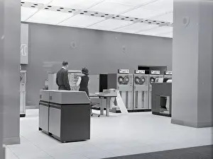 Attendant Prints: Large Computers Occupying Room