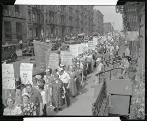 Large Crowd of People with Protest Signs in Street