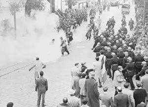 Tear Gas Prints: Large Force Of Police Clearing A Street