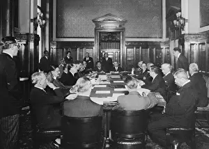 Large Group of Men Sitting at Table