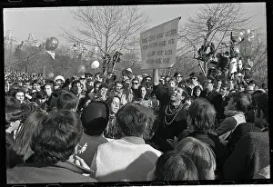 Large Group of Young People Congregated in Central Park