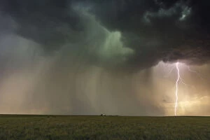John Finney Photography Gallery: Large Lightning Bolt with a vibrant sky at sunset, Stonham, Colorado. USA