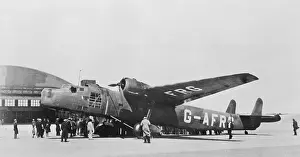 Bombing Prints: Large Plane At Air Base