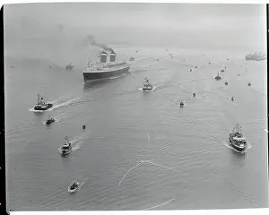 Large and Smaller Military Ships in Ocean Waters