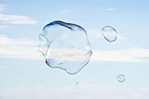 Images Dated 1st November 2011: Large soap bubbles in front of a bright blue sky