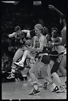 Larry Bird Attempting to Gain Control of Ball