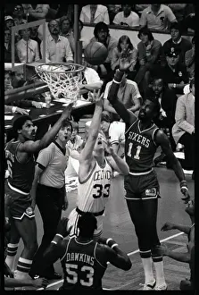 Larry Bird Prints: Larry Bird Scoring While Surrounded by the Opposition