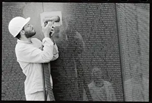 Couch Prints: Larry Century Using Chiseling Tools on Vietnam Memorial