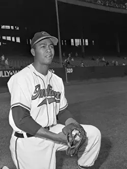 A Home Run of History: Larry Doby Posing with Baseball Glove