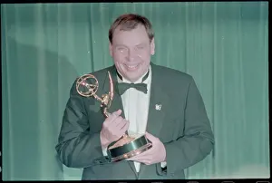 Larry Drake Holding His Emmy Award