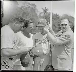 Larry McPhail Placing Protective Inserts in Player's Hat