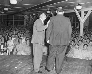 Prints of (Original Caption) 2/17/1942-British Guiana: Stan Laurel, left, and Oliver Hardy entertaining troops in British Guiana Timeless Comedy Icons: Classic Moments from the Legendary Duo: Laurel And Hardy Entertaining Troops