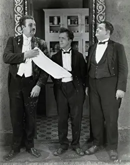 Prints of (Original Caption). Comedians Stan Laurel (1890-1965) and Oliver Hardy (1892-1957), in an undated movie still Timeless Comedy Icons: Classic Moments from the Legendary Duo: Laurel & Hardy W/Pie-(?)-Splattered Man