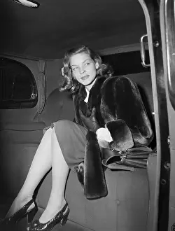 Lauren Bacall Steps from Railroad Car