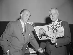 Two Lawyers Reading Hollywood Confidential Magazine